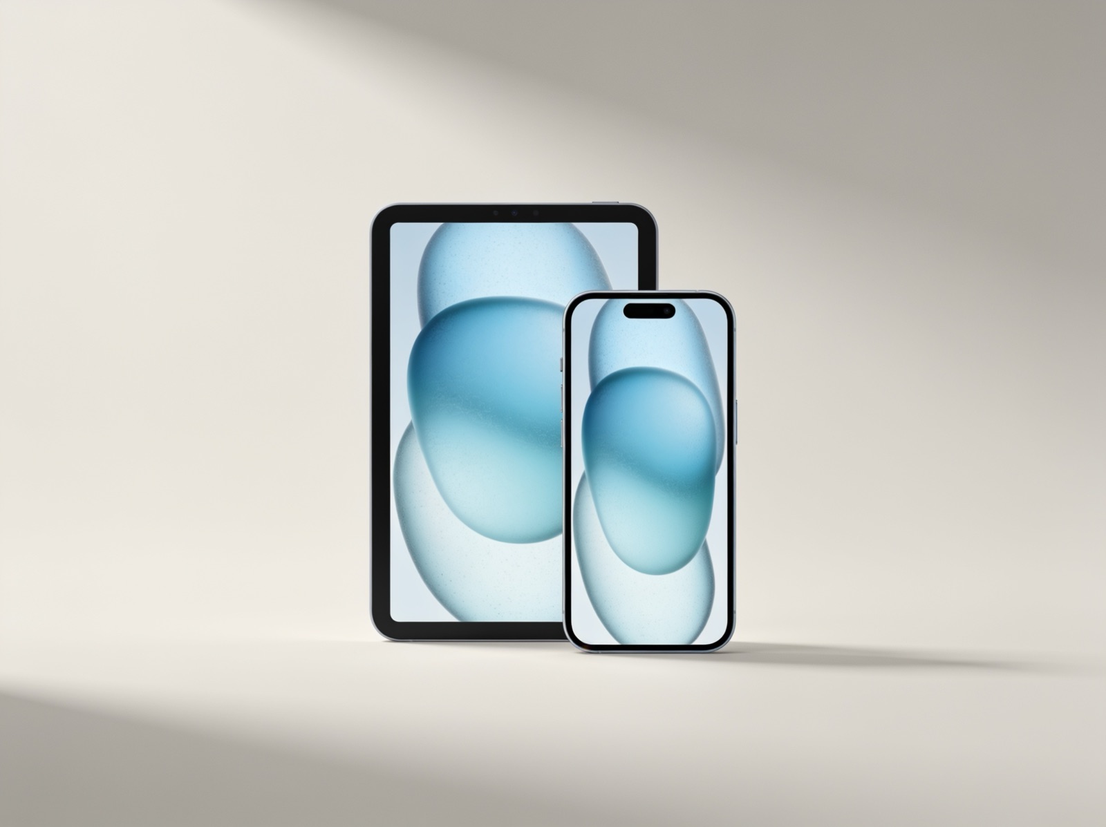 iPhone and iPad on warm gray background